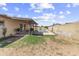 Sprawling backyard with patio, pool, and block fence is perfect for entertaining at 15619 N 58Th Ave, Glendale, AZ 85306
