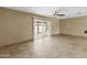 Cozy living space with tile flooring, sliding glass doors, and lots of natural light at 15619 N 58Th Ave, Glendale, AZ 85306