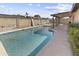 Enjoy outdoor living with this sparkling swimming pool and patio in a private backyard at 15619 N 58Th Ave, Glendale, AZ 85306