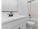 Clean, bright bathroom featuring a vanity with white countertop and a shower-tub combo at 16575 N Lunar St, Maricopa, AZ 85138