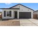 Charming single-story home featuring a two-car garage and stylish modern farmhouse design at 16575 N Lunar St, Maricopa, AZ 85138