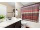 Bathroom featuring sink, toilet, and shower/tub combination at 1677 W Seagull Ct, Chandler, AZ 85286