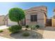 Beautiful single-Gathering home with a well-maintained desert-style front yard and mature landscaping at 1677 W Seagull Ct, Chandler, AZ 85286