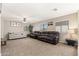 Spacious living area with plush seating and natural light at 1677 W Seagull Ct, Chandler, AZ 85286