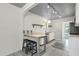 Bright kitchen with modern appliances, stainless steel dishwasher, and breakfast bar with seating at 1719 E Pinchot Ave, Phoenix, AZ 85016