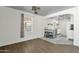 Open-concept living room connects to the kitchen with a breakfast bar and modern finishes at 1719 E Pinchot Ave, Phoenix, AZ 85016