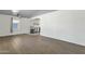 Open living area showcasing hardwood floors and seamless transition to the kitchen at 1719 E Pinchot Ave, Phoenix, AZ 85016