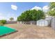 Expansive backyard offering a storage shed and lots of room to create your own outdoor living space at 1750 W Mohawk Ln, Phoenix, AZ 85027