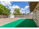 Backyard featuring partial artificial lawn, shed and block wall at 1750 W Mohawk Ln, Phoenix, AZ 85027