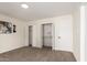 Bedroom featuring carpet flooring and bi-fold door closets at 1750 W Mohawk Ln, Phoenix, AZ 85027