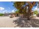 Charming single-story home with a 2-car garage, enhanced by established trees and minimal landscaping at 1750 W Mohawk Ln, Phoenix, AZ 85027