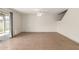 Spacious living room with tile floors, ceiling fan, and sliding glass door to the backyard at 1761 E 38Th Ave, Apache Junction, AZ 85119