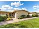 Charming front exterior of a home with a well-maintained lawn and drought-tolerant landscaping at 17627 N 104Th Ave, Sun City, AZ 85373