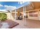 Spacious covered patio with outdoor seating, tiled flooring, and access to the house at 17627 N 104Th Ave, Sun City, AZ 85373