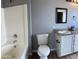 Bathroom featuring a shower and vanity with storage at 1876 N Parkside Ln, Casa Grande, AZ 85122
