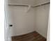 White walk-in closet, offering ample space for storage at 1876 N Parkside Ln, Casa Grande, AZ 85122