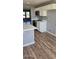 Bright kitchen features an island, stainless steel appliances, and ample cabinet space at 1876 N Parkside Ln, Casa Grande, AZ 85122