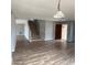 Entryway with open staircase and new wood-look floors at 1876 N Parkside Ln, Casa Grande, AZ 85122