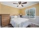Bedroom offers neutral walls, laminate flooring and a window providing great natural light at 19645 N 3Rd Ave, Phoenix, AZ 85027