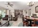 Open-concept living space featuring tile floors, recessed lighting, and a view of the kitchen at 21056 W Granada Rd, Buckeye, AZ 85396