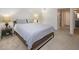 Cozy bedroom with comfortable carpet, soft lighting, and simple decor at 2146 W Isabella Ave # 154, Mesa, AZ 85202