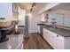Updated kitchen with granite countertops, stainless steel appliances, and wood-look tile flooring at 2146 W Isabella Ave # 154, Mesa, AZ 85202