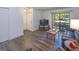 Bright living room with tile floors, modern furniture, and access to the outdoors at 2146 W Isabella Ave # 154, Mesa, AZ 85202