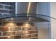 Stainless steel range hood with decorative brick backsplash at 2146 W Isabella Ave # 154, Mesa, AZ 85202