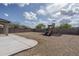 Backyard featuring a patio and a playset with swings and slide at 21882 N 260Th Ln, Buckeye, AZ 85396