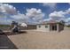 Backyard showing patio and playground with view of home at 21882 N 260Th Ln, Buckeye, AZ 85396