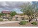 Community park featuring picnic shelter, BBQ, playground and green spaces for outdoor enjoyment at 21882 N 260Th Ln, Buckeye, AZ 85396