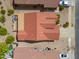 Overhead aerial view of a single Gathering home with a red tile roof and a gravel yard at 2380 E Seville Ct, Casa Grande, AZ 85194