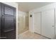 Bathroom with glass shower enclosure and storage cabinets at 2380 E Seville Ct, Casa Grande, AZ 85194