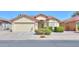 Charming single-story home featuring a well-maintained front yard and desert landscaping at 2380 E Seville Ct, Casa Grande, AZ 85194