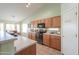 The kitchen features ample cabinetry, counter space, and modern appliances at 2380 E Seville Ct, Casa Grande, AZ 85194