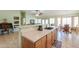 Bright open kitchen has a stainless steel dishwasher and double basin sink at 2380 E Seville Ct, Casa Grande, AZ 85194