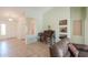 Cozy living room with antique desk, and tile flooring at 2380 E Seville Ct, Casa Grande, AZ 85194