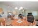 Living and dining space in an open floor plan with kitchen visible at 2380 E Seville Ct, Casa Grande, AZ 85194
