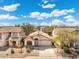 Beautiful single Gathering home with attached two-car garage and low-maintenance desert landscaping at 2523 W Running Deer Trl, Phoenix, AZ 85085