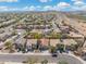 An aerial view of a desert neighborhood with single-Gathering homes and pools at 2523 W Running Deer Trl, Phoenix, AZ 85085