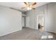 Large bedroom with a vaulted ceiling, fan, and en-suite bathroom at 2523 W Running Deer Trl, Phoenix, AZ 85085