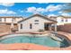 Inviting backyard swimming pool, perfect for Gathering fun and entertaining, complete with desert landscaping at 2523 W Running Deer Trl, Phoenix, AZ 85085