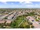 Extensive aerial shot of a planned community with parks, neatly arranged homes, and a Gathering-friendly environment at 2664 E Ebony Dr, Chandler, AZ 85286