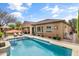 Tranquil pool area with lounge chairs and lush greenery at 2664 E Ebony Dr, Chandler, AZ 85286