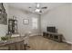 Comfortable home office/bedroom with desk, TV and neutral tones at 2664 E Ebony Dr, Chandler, AZ 85286