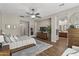 The main bedroom features a plush rug, ensuite bathroom, and relaxing atmosphere at 2664 E Ebony Dr, Chandler, AZ 85286