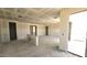 Spacious living room featuring unfinished drywall ready for customization and design at 32139 N Lone Rancher Way, San Tan Valley, AZ 85140