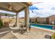 Cozy outdoor patio and pool area with stylish decorations at 3219 W Pollack St, Phoenix, AZ 85041