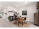 Charming dining area featuring stylish decor, a modern light fixture, and a cozy atmosphere for meals at 3219 W Pollack St, Phoenix, AZ 85041