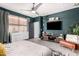 Stylish main bedroom with modern decor and a comfortable seating area offering a relaxing retreat at 3219 W Pollack St, Phoenix, AZ 85041